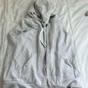 Athletic girl, gray sweatshirt